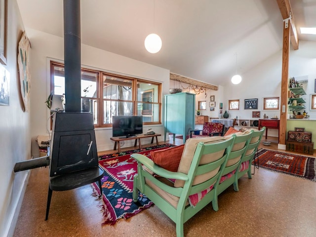 900 Pedernales Oaks Dr, Johnson City, TX 78636 - living room featuring high vaulted ceiling, a wood stove, beam ceiling, and baseboards