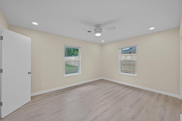 8507 Parkfield Dr, Austin, TX 78758 - spare room featuring a ceiling fan, light wood-style floors, baseboards, and recessed lighting