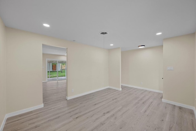 8507 Parkfield Dr, Austin, TX 78758 - spare room with light wood finished floors, baseboards, and recessed lighting