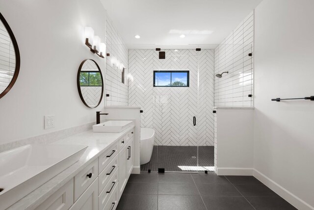 310 Apache Tears, Horseshoe Bay, TX 78657 - bathroom with a shower stall, tile patterned flooring, double vanity, and baseboards