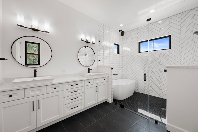 310 Apache Tears, Horseshoe Bay, TX 78657 - full bath featuring double vanity, a stall shower, tile patterned floors, a freestanding tub, and recessed lighting