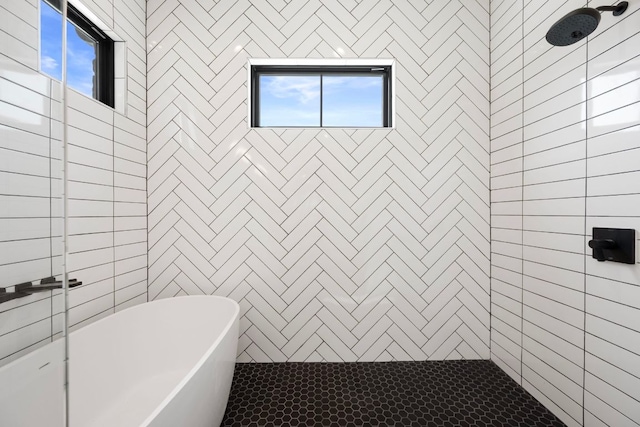 310 Apache Tears, Horseshoe Bay, TX 78657 - bathroom featuring a soaking tub, healthy amount of natural light, and tiled shower