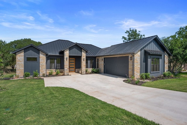 310 Apache Tears, Horseshoe Bay, TX 78657 - view of front of house with a standing seam roof, stone siding, a metal roof, and driveway