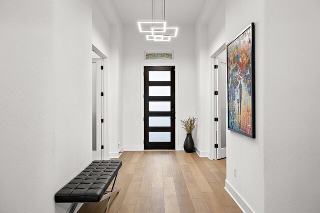 3417 Prairie Heights Dr, Leander, TX 78641 - doorway featuring light wood finished floors and baseboards