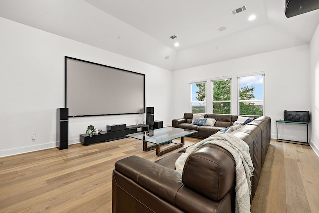 3417 Prairie Heights Dr, Leander, TX 78641 - home theater room featuring vaulted ceiling, light wood-type flooring, baseboards, and recessed lighting