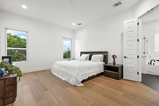 3417 Prairie Heights Dr, Leander, TX 78641 - bedroom with light wood-style flooring, recessed lighting, and baseboards
