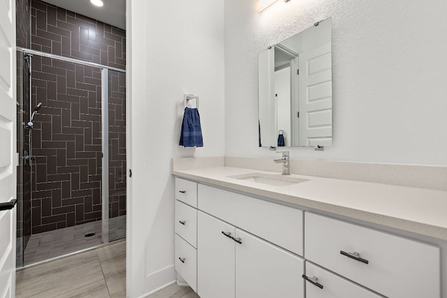3417 Prairie Heights Dr, Leander, TX 78641 - bathroom with tiled shower, vanity, and recessed lighting