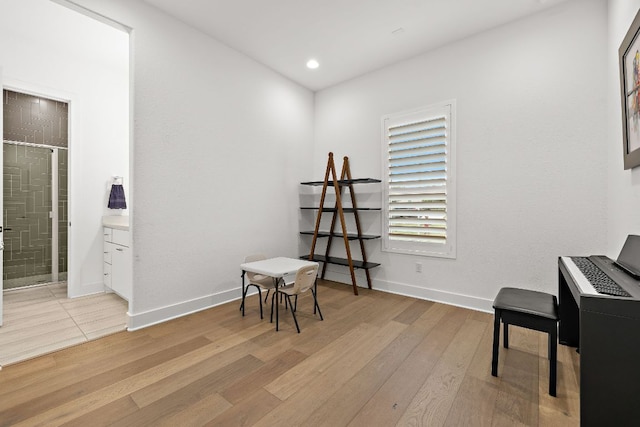 3417 Prairie Heights Dr, Leander, TX 78641 - living area with light wood-style floors, baseboards, and recessed lighting