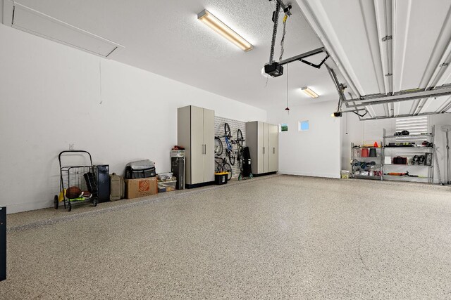 3417 Prairie Heights Dr, Leander, TX 78641 - garage featuring a garage door opener