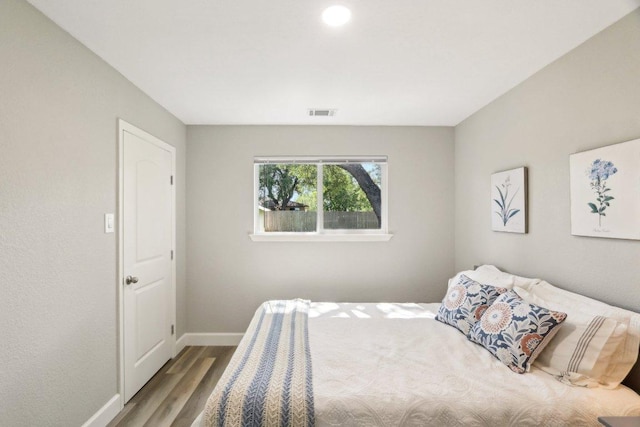 302 Martin Luther King St, Georgetown, TX 78626 - bedroom with wood finished floors and baseboards