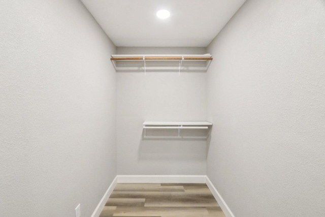 302 Martin Luther King St, Georgetown, TX 78626 - walk in closet featuring wood finished floors