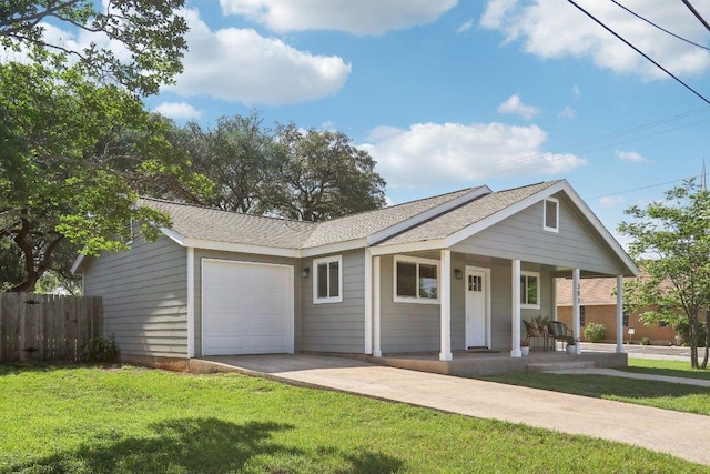 302 Martin Luther King St, Georgetown, TX 78626 - ranch-style home with a garage, driveway, a porch, and roof with shingles