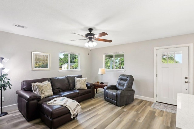 302 Martin Luther King St, Georgetown, TX 78626 - living area with light wood finished floors and ceiling fan