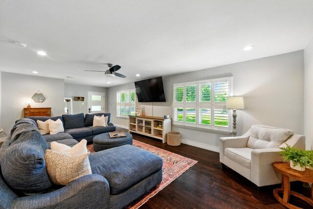 701 Nixon St, Lockhart, TX 78644 - living room featuring wood finished floors, recessed lighting, ceiling fan, and baseboards