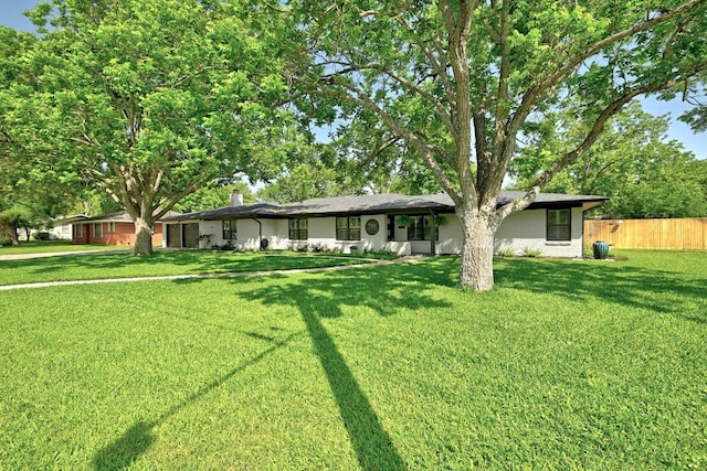 701 Nixon St, Lockhart, TX 78644 - ranch-style home featuring a chimney