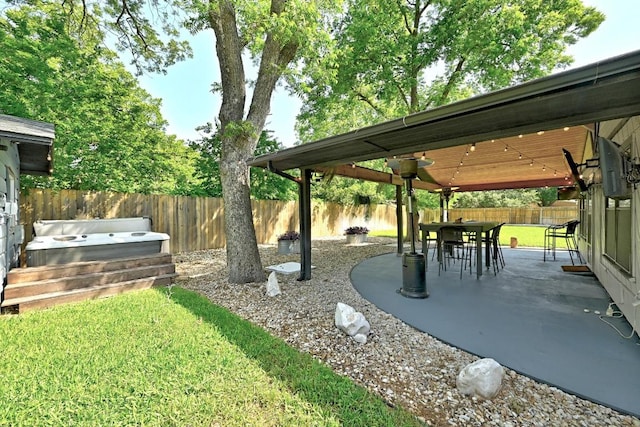 701 Nixon St, Lockhart, TX 78644 - view of yard with a covered hot tub, a patio, and a gazebo
