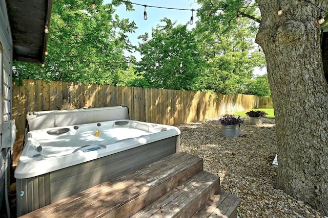 701 Nixon St, Lockhart, TX 78644 - deck with a hot tub
