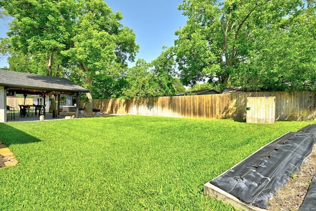701 Nixon St, Lockhart, TX 78644 - view of yard with a patio area