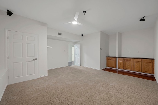 5804 Gentle Breeze Ter, Austin, TX 78731 - empty room with carpet flooring, a pendent fire sprinkler, ceiling fan, and baseboards