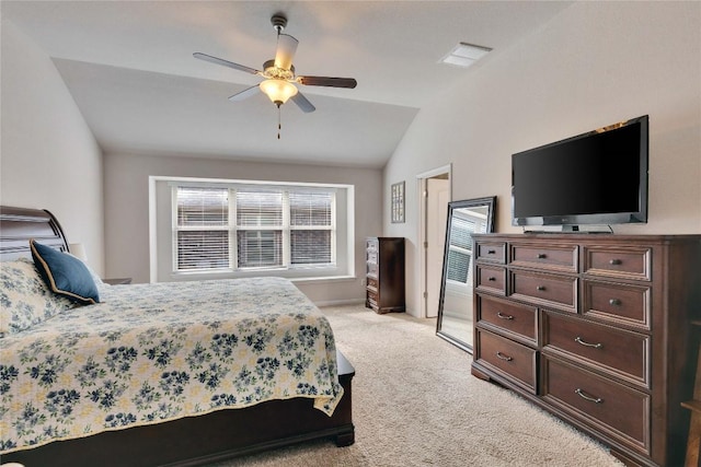 131 Mount Ellen St, Hutto, TX 78634 - bedroom featuring light colored carpet, vaulted ceiling, ceiling fan, and baseboards