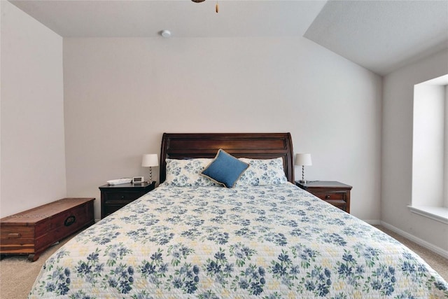 131 Mount Ellen St, Hutto, TX 78634 - bedroom featuring carpet flooring, vaulted ceiling, baseboards, and ceiling fan