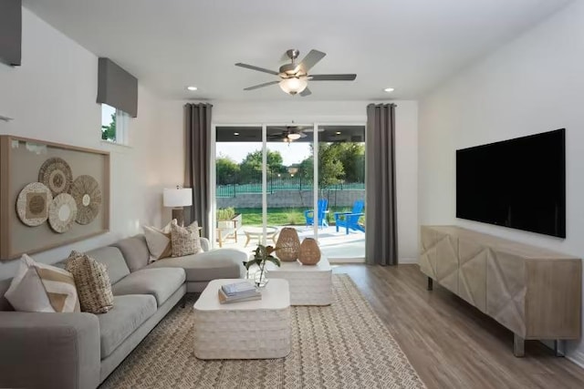 123 Crossbar St, Georgetown, TX 78633 - living area featuring a ceiling fan, wood finished floors, and recessed lighting