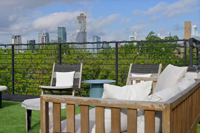 2002 E 8th St, Austin, TX 78702 - view of patio featuring a skyline view, an outdoor hangout area, and a balcony