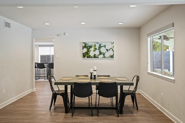 12308 Wycliff Ln, Austin, TX 78727 - dining space featuring dark wood finished floors and recessed lighting