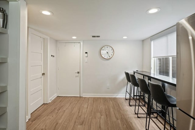 12308 Wycliff Ln, Austin, TX 78727 - dining room featuring wood finished floors and recessed lighting