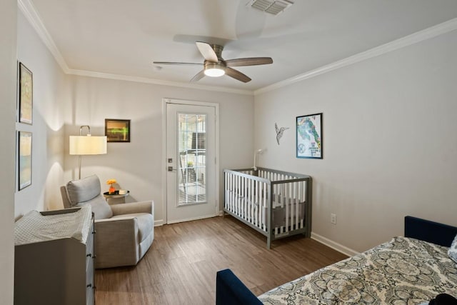 12308 Wycliff Ln, Austin, TX 78727 - bedroom featuring wood finished floors, crown molding, and ceiling fan