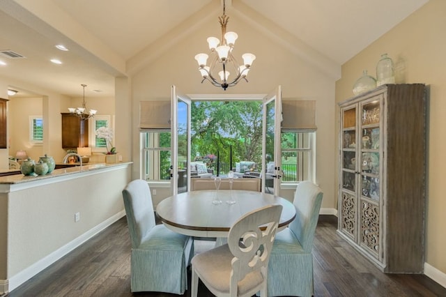 12525 Gray Camlet Ln, Austin, TX 78748 - dining space featuring a chandelier, dark wood finished floors, healthy amount of natural light, and recessed lighting