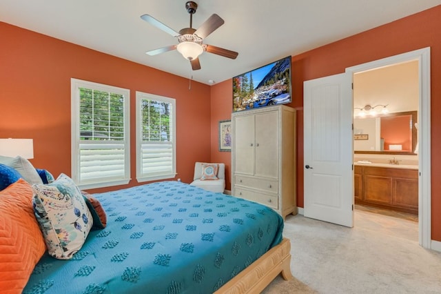 12525 Gray Camlet Ln, Austin, TX 78748 - bedroom with light colored carpet, ensuite bath, ceiling fan, and a sink