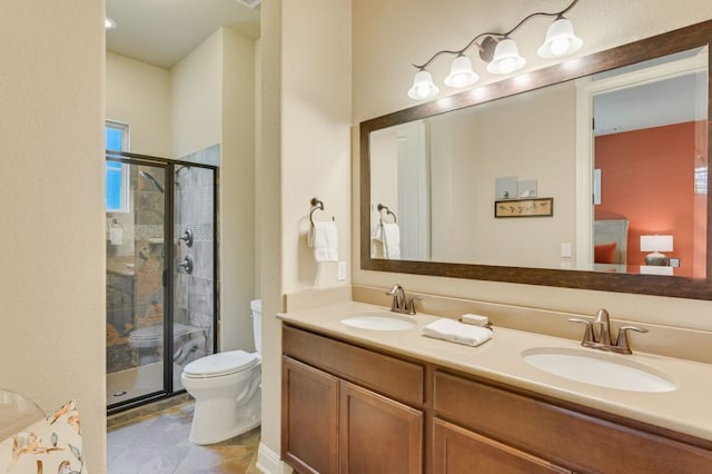 12525 Gray Camlet Ln, Austin, TX 78748 - full bathroom with toilet, a shower stall, double vanity, and ensuite bathroom