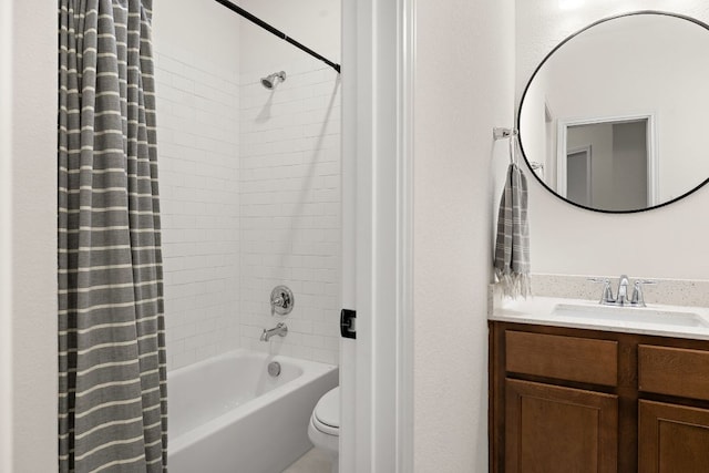 full bath with toilet, shower / bath combo, and vanity