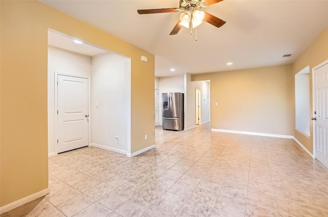 129 Bosque Dr, San Marcos, TX 78666 - spare room with ceiling fan, recessed lighting, baseboards, and light tile patterned floors