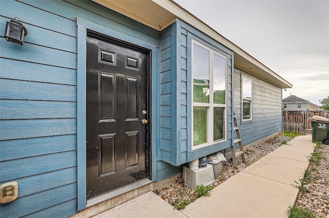 129 Bosque Dr, San Marcos, TX 78666 - view of exterior entry featuring fence