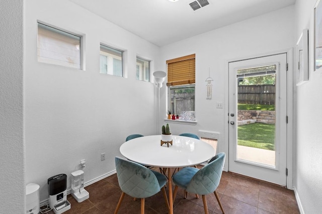 1121 Salem Park Ct, Austin, TX 78745 - dining room with tile patterned flooring and baseboards