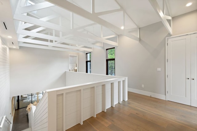 607 Terrell Hill Dr Unit B, Austin, TX 78704 - hallway featuring hardwood / wood-style flooring, baseboards, recessed lighting, high vaulted ceiling, and beam ceiling