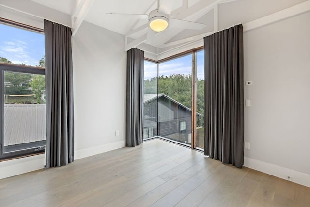 607 Terrell Hill Dr Unit B, Austin, TX 78704 - spare room featuring ceiling fan, wood finished floors, and healthy amount of natural light