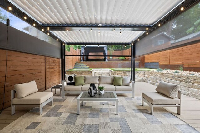607 Terrell Hill Dr Unit B, Austin, TX 78704 - view of patio featuring a fenced backyard and an outdoor living space