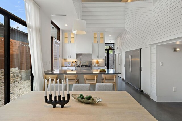 607 Terrell Hill Dr Unit B, Austin, TX 78704 - dining room featuring baseboards and recessed lighting