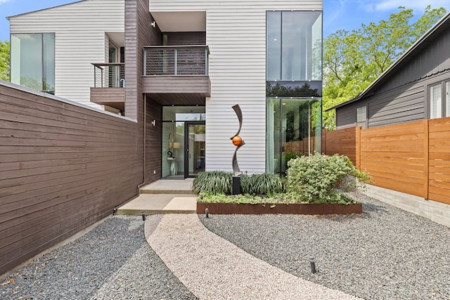 607 Terrell Hill Dr Unit B, Austin, TX 78704 - doorway to property with fence and a balcony