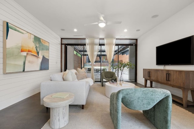 607 Terrell Hill Dr Unit B, Austin, TX 78704 - living room with wooden walls, recessed lighting, and ceiling fan