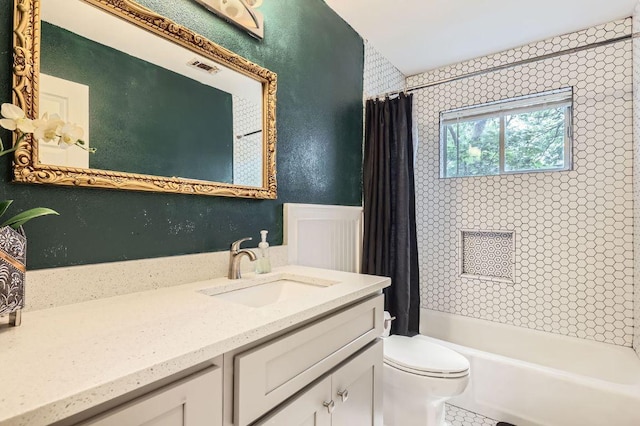 906 Hermitage Dr, Austin, TX 78753 - bathroom with toilet, vanity, shower / tub combo with curtain, and a textured wall