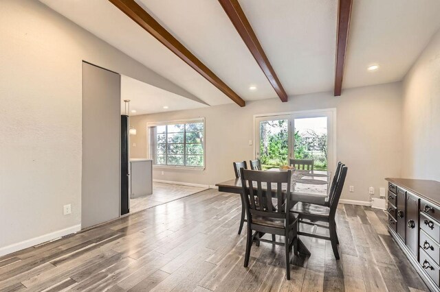 906 Hermitage Dr, Austin, TX 78753 - dining room with beamed ceiling, wood finished floors, baseboards, and recessed lighting