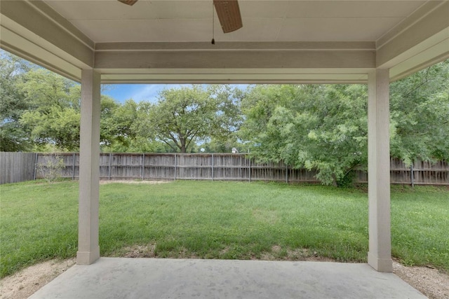 1012 Klondike Loop, Round Rock, TX 78665 - fenced backyard featuring a ceiling fan and a patio area