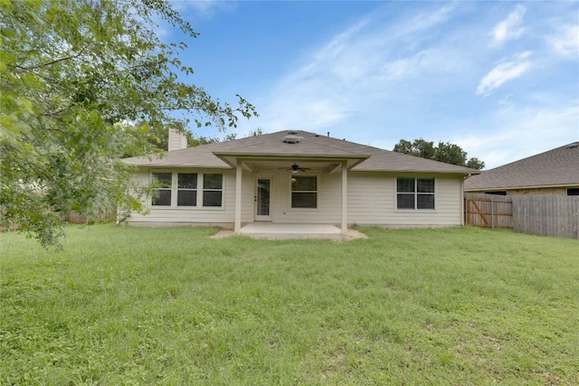 1012 Klondike Loop, Round Rock, TX 78665 - back of property featuring a ceiling fan, a patio area, and a chimney