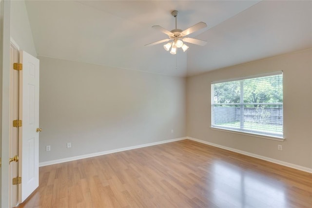 1012 Klondike Loop, Round Rock, TX 78665 - spare room with light wood-style floors, ceiling fan, and lofted ceiling