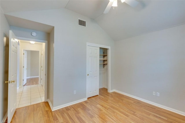 1012 Klondike Loop, Round Rock, TX 78665 - unfurnished bedroom featuring vaulted ceiling, a closet, light wood-style flooring, and a ceiling fan
