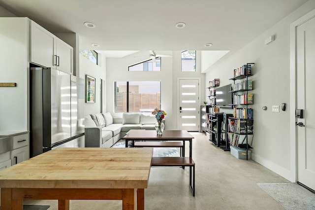 1405 Perez St Unit 2, Austin, TX 78721 - living area featuring concrete flooring and recessed lighting